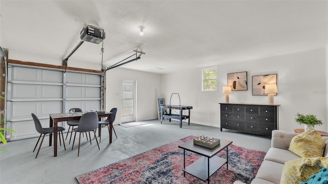 garage with baseboards and a garage door opener