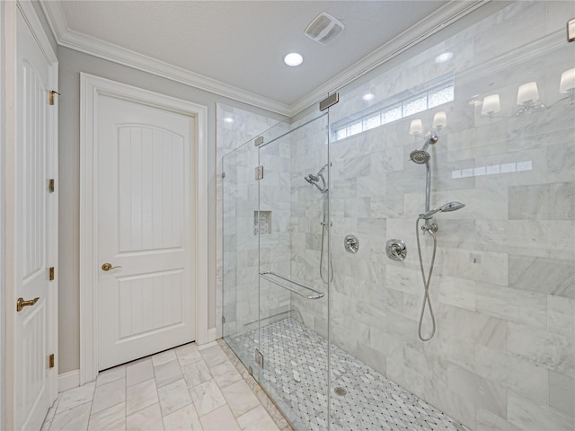 full bath with a stall shower, visible vents, marble finish floor, and ornamental molding