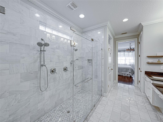 ensuite bathroom featuring visible vents, a shower stall, ensuite bathroom, and crown molding