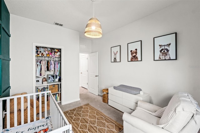 bedroom featuring carpet floors, baseboards, and visible vents