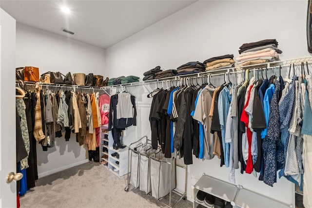 spacious closet featuring carpet and visible vents