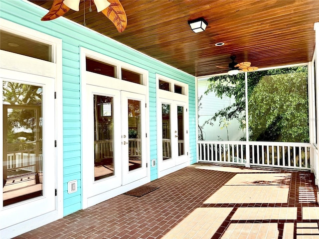 view of patio featuring ceiling fan, french doors, and a porch