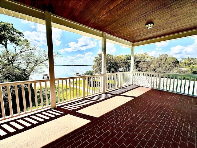 view of patio / terrace with a water view