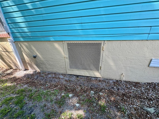 details featuring stucco siding