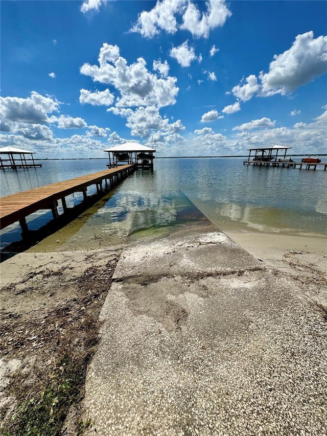 view of dock with a water view