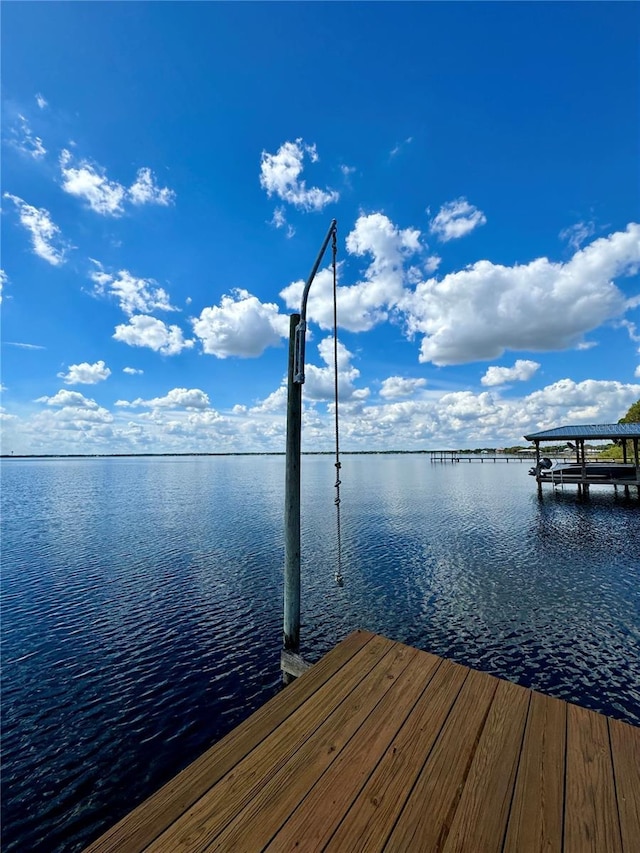 view of dock with a water view