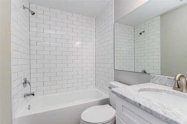 full bath with toilet, vanity, and bathtub / shower combination