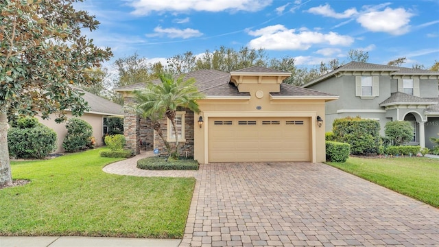 view of front facade with a garage, a front lawn, decorative driveway, and stucco siding