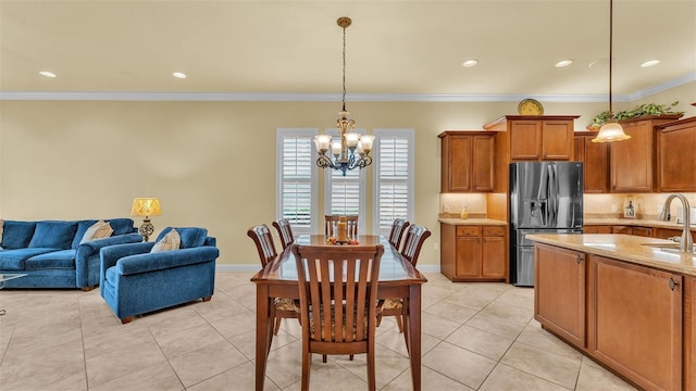 kitchen featuring light countertops, stainless steel refrigerator with ice dispenser, backsplash, and brown cabinets