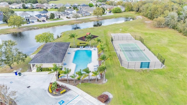 bird's eye view with a water view and a residential view