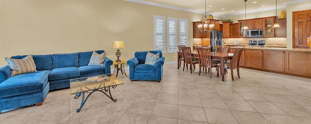 interior space featuring baseboards, ornamental molding, light tile patterned flooring, a chandelier, and recessed lighting