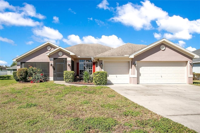 ranch-style home featuring a front yard, driveway, a shingled roof, stucco siding, and a garage