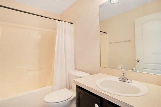 bathroom with toilet, vanity, and shower / tub combo