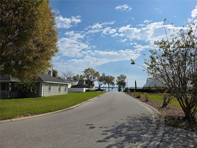 view of street featuring curbs