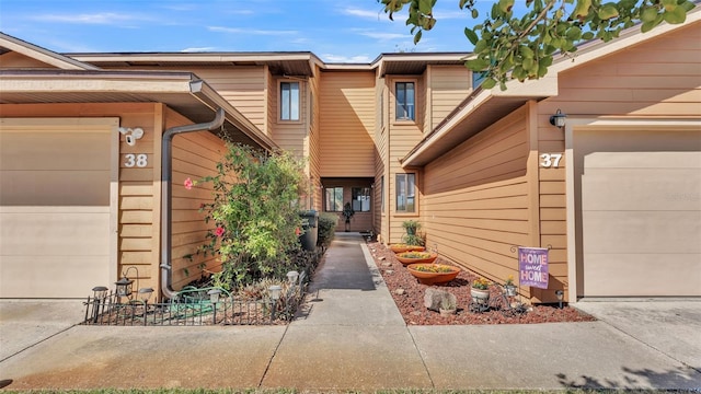 entrance to property featuring a garage