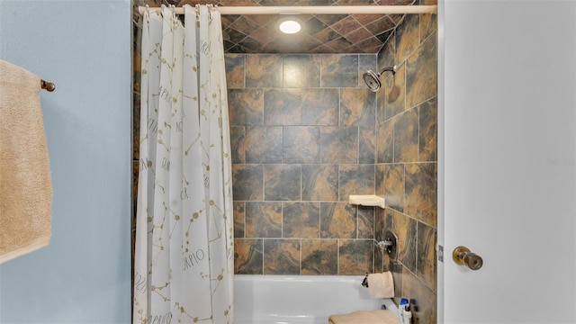 bathroom featuring shower / bath combination with curtain