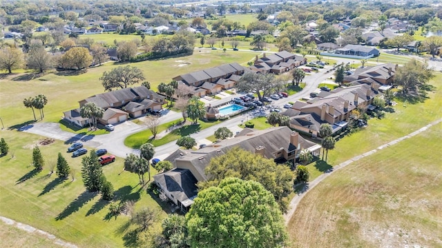 birds eye view of property with a residential view