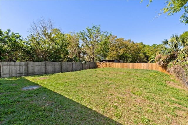 view of yard featuring fence