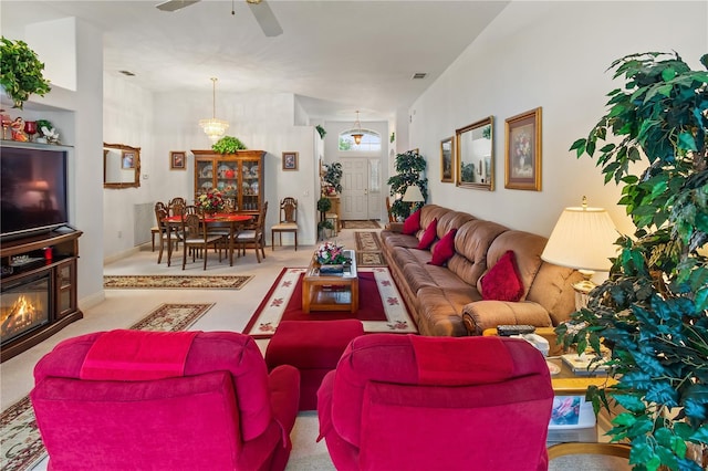 living area with a ceiling fan