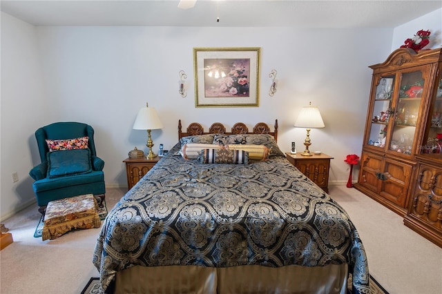 bedroom featuring carpet floors and baseboards