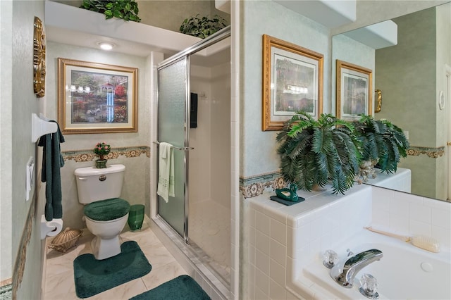 bathroom with toilet, a stall shower, and a garden tub