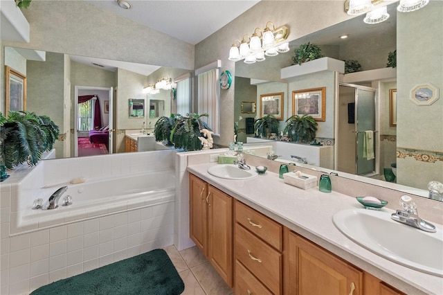 full bath with vaulted ceiling, a sink, a shower stall, a bath, and tile patterned floors