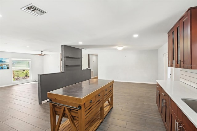 kitchen featuring recessed lighting, open floor plan, visible vents, and ceiling fan