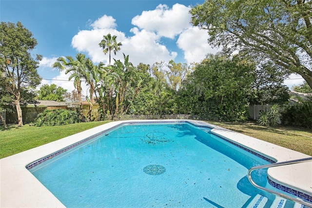 view of pool featuring a fenced backyard, a fenced in pool, and a yard