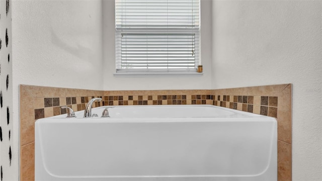 full bath featuring a tub to relax in