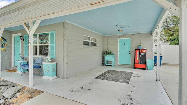 view of patio / terrace featuring fence