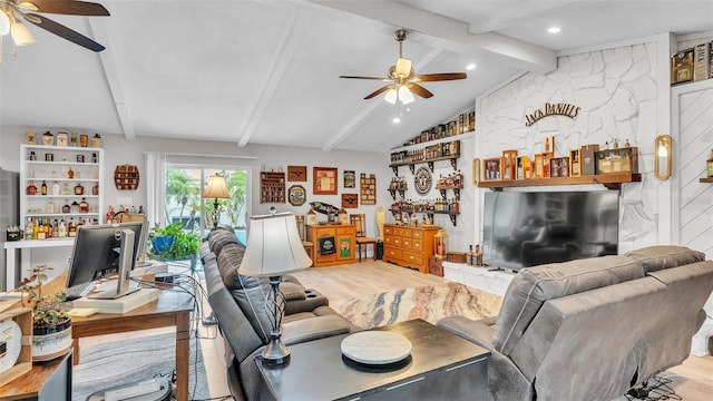 living area with vaulted ceiling with beams, wood finished floors, and a ceiling fan