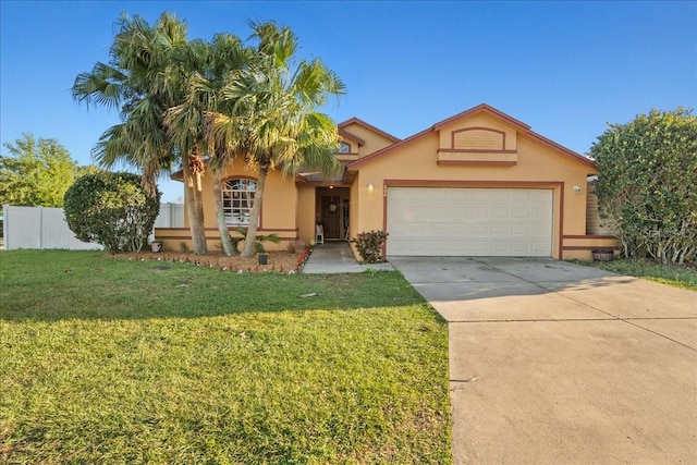 view of front of house with a garage, concrete driveway, fence, a front lawn, and stucco siding