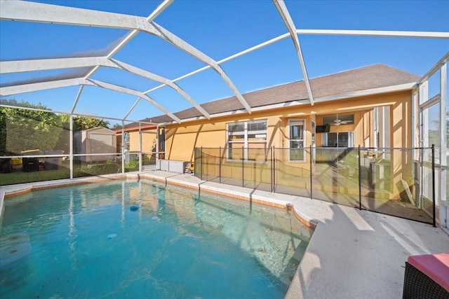 outdoor pool featuring a lanai and a patio