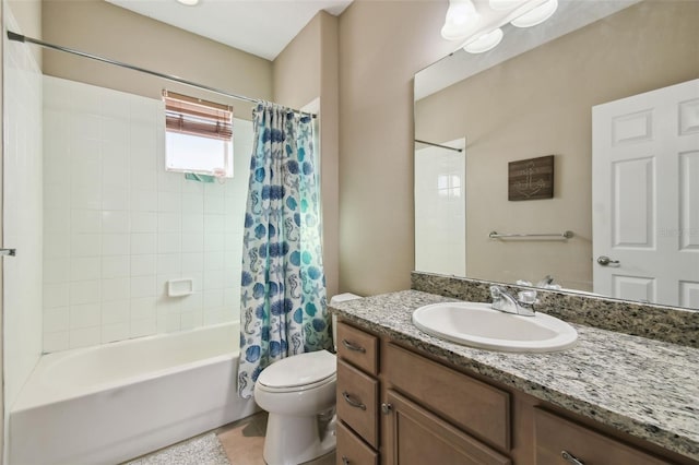 bathroom featuring shower / tub combo, vanity, toilet, and tile patterned floors