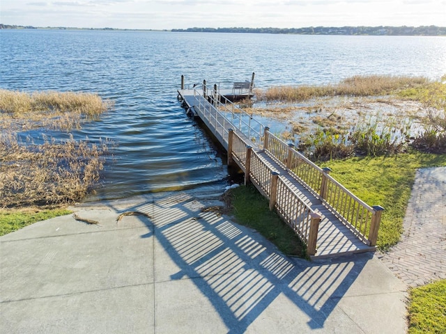 dock area featuring a water view