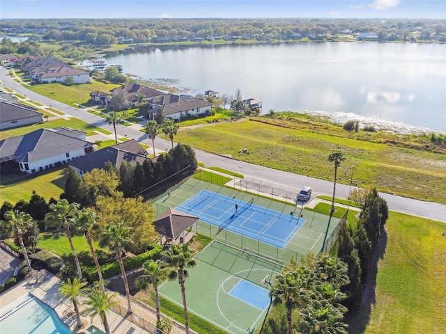 bird's eye view featuring a residential view and a water view