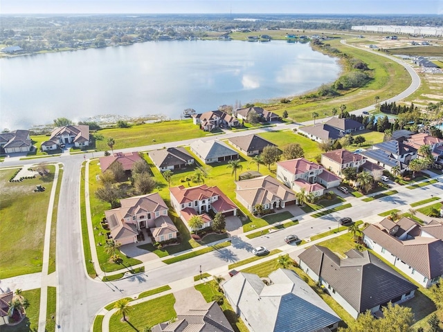 aerial view featuring a water view and a residential view