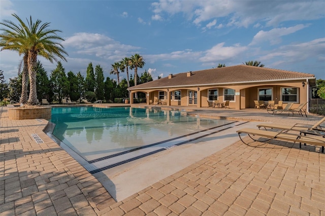 community pool featuring a patio