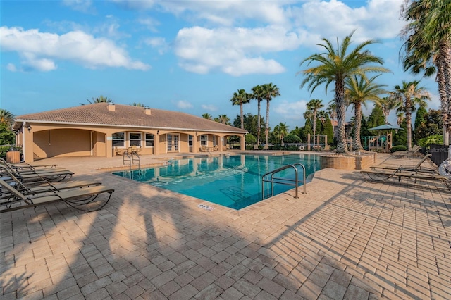 pool with a patio