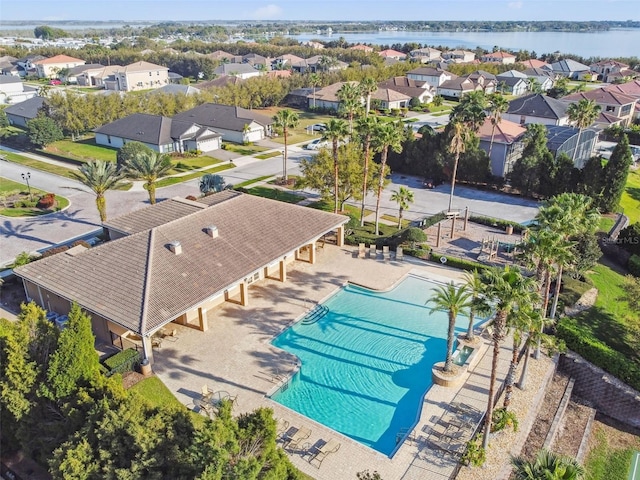 aerial view with a residential view and a water view