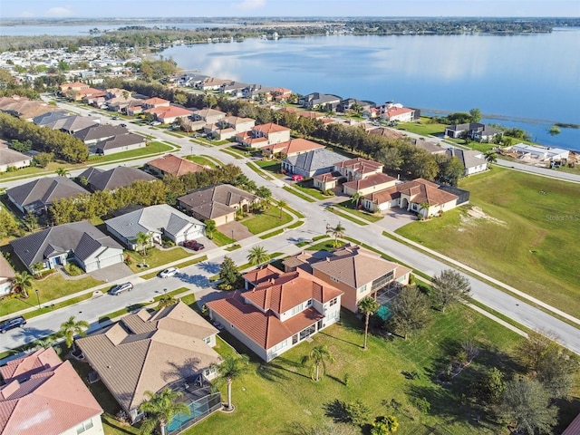 aerial view featuring a residential view and a water view