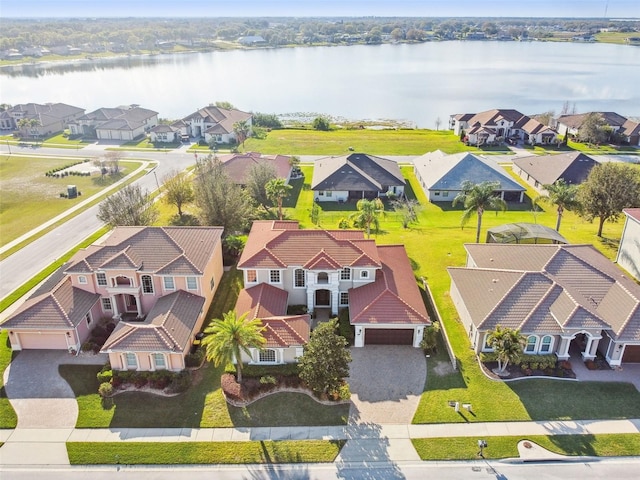 aerial view featuring a water view and a residential view