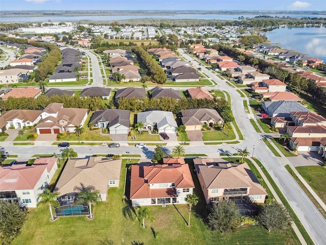 aerial view with a water view and a residential view