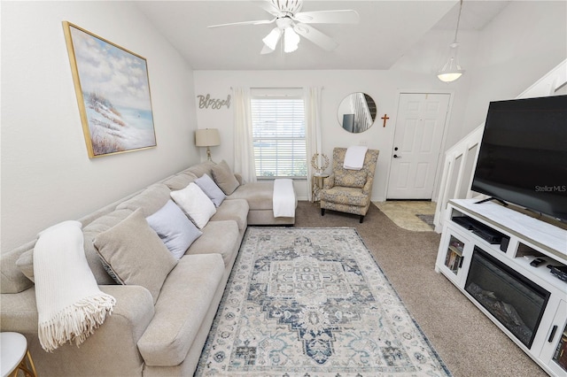 living room with ceiling fan and carpet floors