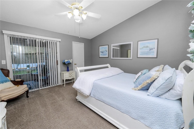 carpeted bedroom with vaulted ceiling and ceiling fan