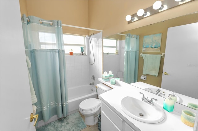 full bathroom with vanity, tile patterned flooring, shower / bath combination with curtain, and toilet