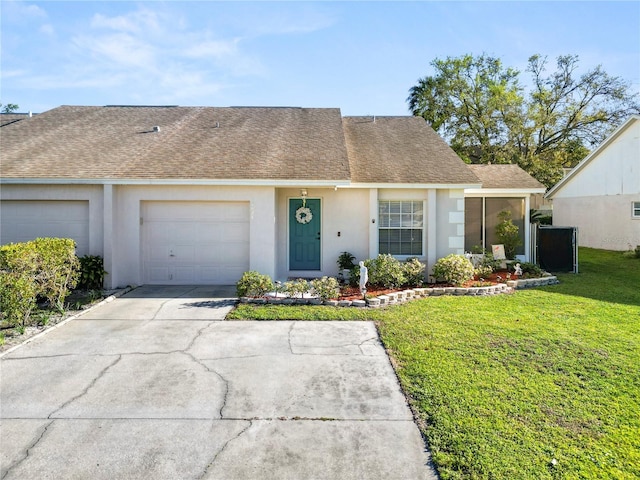 view of front of property with an attached garage, concrete driveway, roof with shingles, stucco siding, and a front lawn