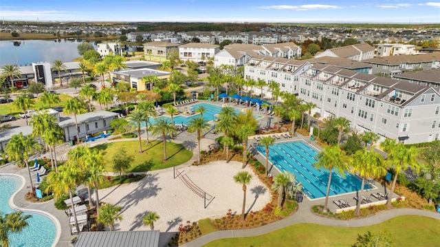 aerial view with a residential view and a water view