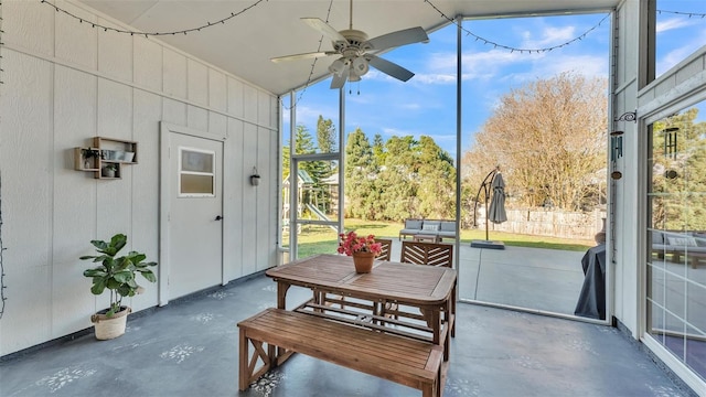 sunroom with a ceiling fan