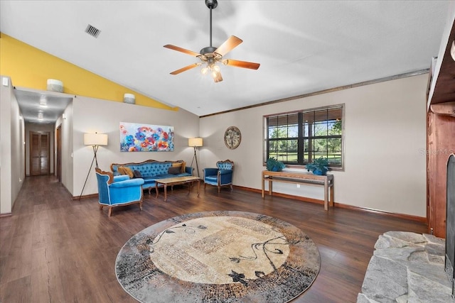 living area featuring wood finished floors, baseboards, visible vents, lofted ceiling, and ceiling fan